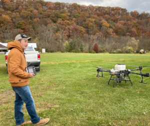 Man operating drone.